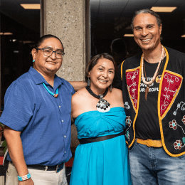 Zowie Banteah ’95 (center) with her family and Larry Spotted Crow Mann (far right).
