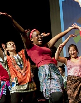 A group of dancers performing to open the BOOM Learning Conference