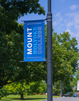 Mount Holyoke banner on the flag post. Photo by Max Wilhelm.