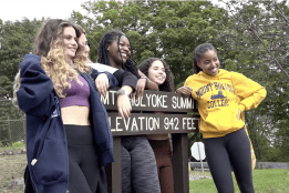 mountain-day-video-poster-2021.png Students pose near the Mount Holyoke Summit sign on Mountain Day 2021