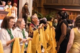 Scarving at Welcome New Alum ceremony, 2023.