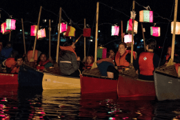 Students in canoes on lower lake