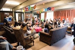 Students gathering in the lounge of Eliot House