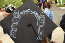 The Mount Holyoke College field gate drawn on a graudation cap