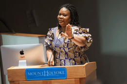 A speaker at a podium