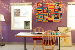 A working table in the living room of the Jeannette Marks Cultural Center
