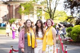 Smiling students pose together on Red Carpet, 2023.