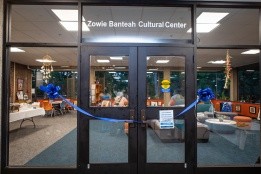 The doors to the Zowie Banteah Cultural Center, adorned with a blue ribbon to mark the grand opening of the new location