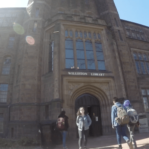 Students walking in and out of the Mount Holyoke College library