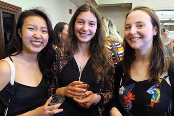 Amy Lim ’18 (left), Julia Kellerbauer ’18 (middle), and Lim’s mentor, Margaret (Gretchen) Lay, assistant professor of economics, were among the 35 seniors and their families, professors and mentors at the Global Competence Awards ceremony.