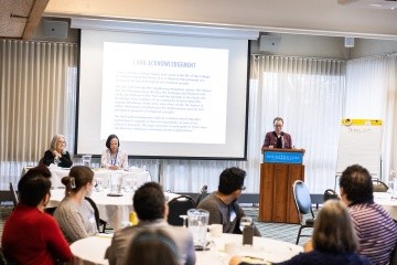 Dr. Beverly Daniel Tatum at the podium during an Intergroup Dialogue meeting for faculty and staff. Photo by Joanna Chattman.