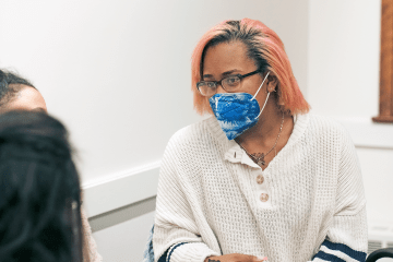 Dr. Kristie Ford in conversation with students