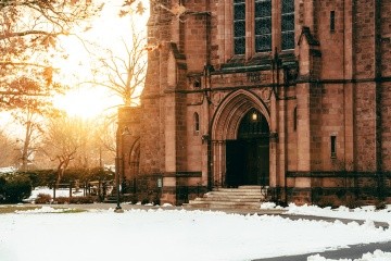 Mount Holyoke College Abbey Chapel in late afternoon winter light. Photo by Max Wilhelm, December 2024.