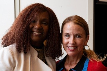 Rha Goddess (left) with Marcella Runell, vice president for student life and dean of students