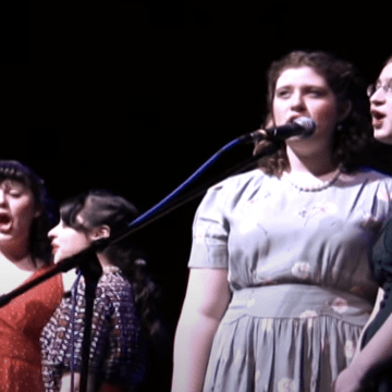 Singers on stage during the Big Broadcast