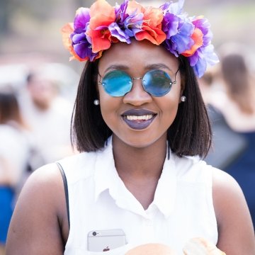 A student wearing a flower crown on Pangy Day