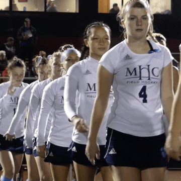 The Mount Holyoke College field hockey team lining up