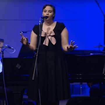 A student singing during the Big Broadcast Radio Show