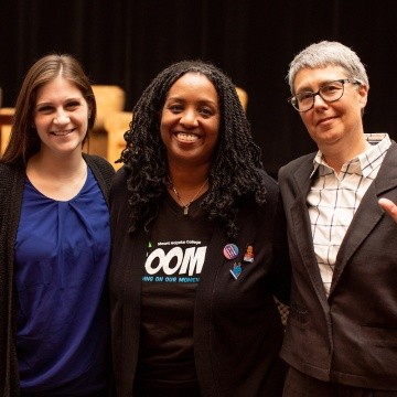 Kijua Sanders-McMurtry poses with BOOM attendees, 2019.