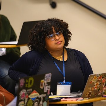 Student paying attention during the Sophomore Institute.