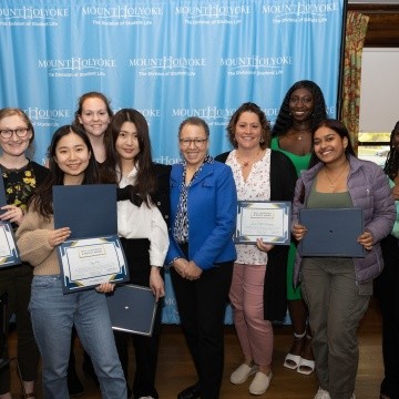Award recipients pose for a photo with Dr. Beverly Daniel Tatum