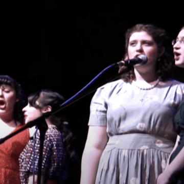 Singers on stage during the Big Broadcast