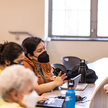MWCE Climate Justice Summit guests in discussion.