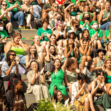 The green griffin class cheering during Convocation 2022