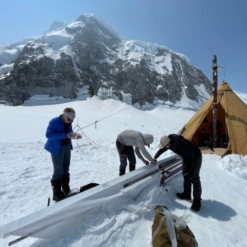 Bridget Hall ’24 and team processing a core from the glacier.