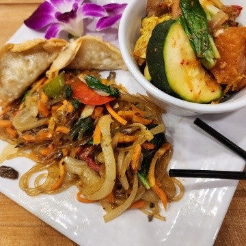 Japchae Noodles with Vegetables and Vegetable Pot Stickers