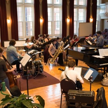 The jazz ensemble rehearing in McCulloch Auditorium in Pratt Hall