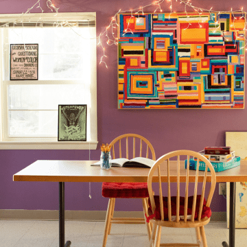A working table in the living room of the Jeannette Marks Cultural Center