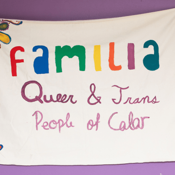 A poster that says &quot;Familia: Queer &amp; Trans People of Color&quot;