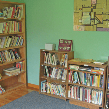 Full bookshelves in the Jeannette Marks Cultural Center