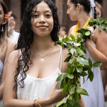 A student with the laurel drain draped over their shoulder during the Laurel Parade 2023