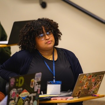 Student paying attention during the Sophomore Institute.
