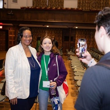 President Holley has photo taken with prospective student at Experience MHC! April 5, 2025, Photo by Jo Chattman.