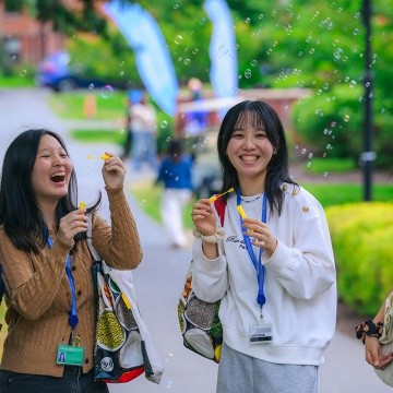 New student orientation 2025 - students blowing bubbles