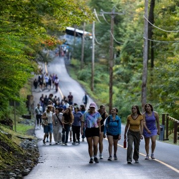 Mount Holyoke students walking up the road leading up to the summit of Mt. Holyoke