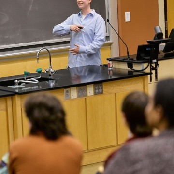 Mount Holyoke College | Senior Symposium 2024 - A 2024 graduate giving a presentation of their research