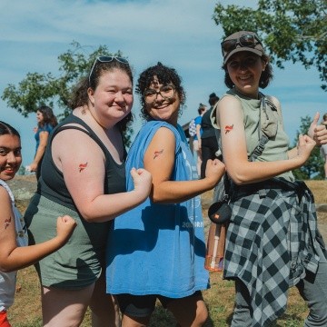 Mountain Day 2024 - Students pose with their temporary tattoos.