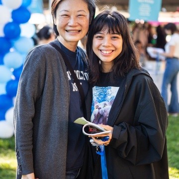 A parent and student hugging on move-in day, 2022