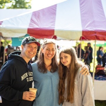 Parents and student enjoying move-in day, 2022