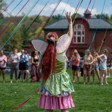 Students participating in the Maypole on Pangy Dat
