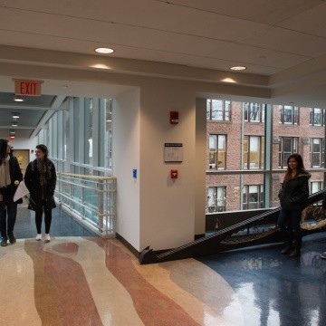 The glass bridge that connects Kendade Hall and Clapp Laboratories