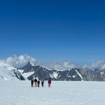 Bridget Hall ’24 and team ski to collect snow surface samples.