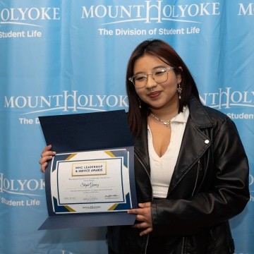 Steph Gomez with award