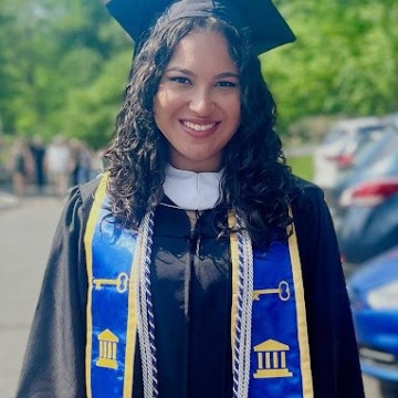 Smiling Posse Scholar in regalia