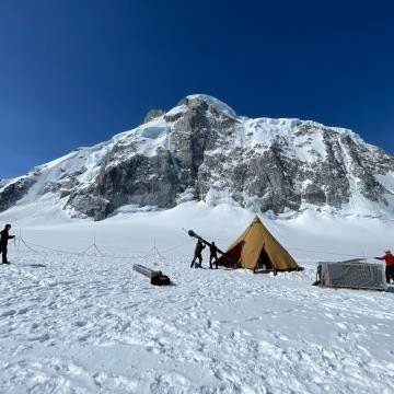 Bridget Hall ’24 working to put up the drill tower on a glacier.