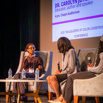 Keynote speaker in conversation with students.